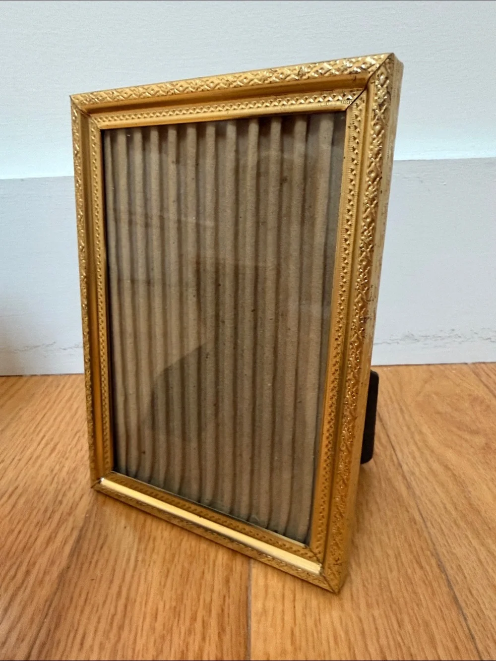 Set of three vintage gold table picture frames. 2x 5x7, 1x 4x6